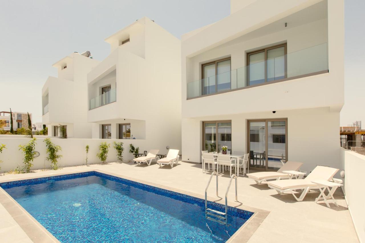 Palm Tree Villas Livadhia Exterior foto