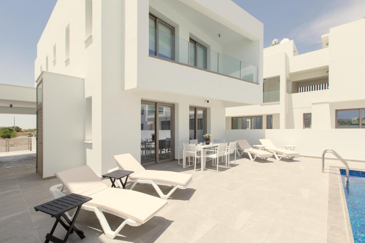 Palm Tree Villas Livadhia Exterior foto